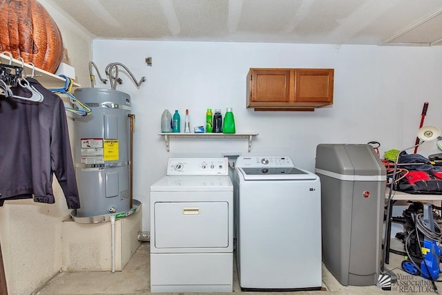 7442 E 24th Ln, Yuma, AZ 85365 - laundry room featuring washing machine and clothes dryer, water heater, and cabinet space