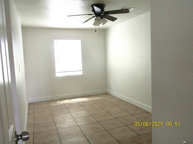 1429 S 12th Dr, Yuma, AZ 85364 - spare room with ceiling fan, light tile patterned flooring, and baseboards