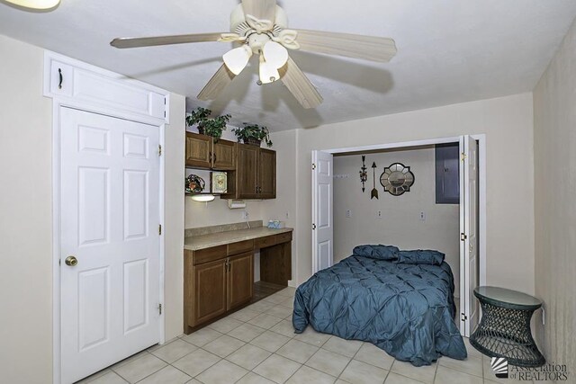 13734 E 47th Dr, Yuma, AZ 85367 - bedroom with a ceiling fan and light tile patterned floors
