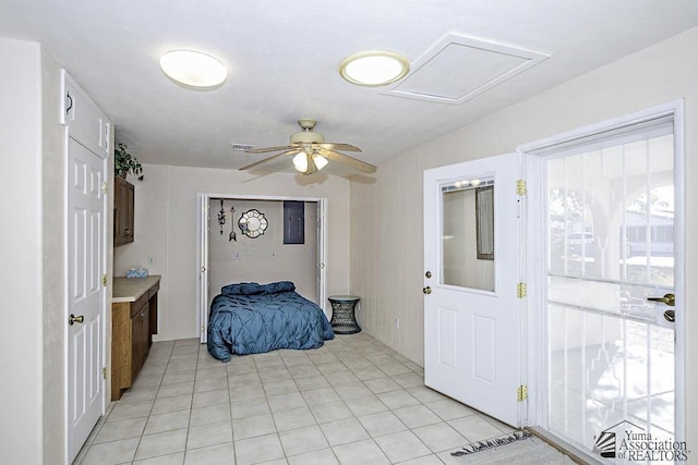 13734 E 47th Dr, Yuma, AZ 85367 - bedroom with attic access, a ceiling fan, and light tile patterned flooring