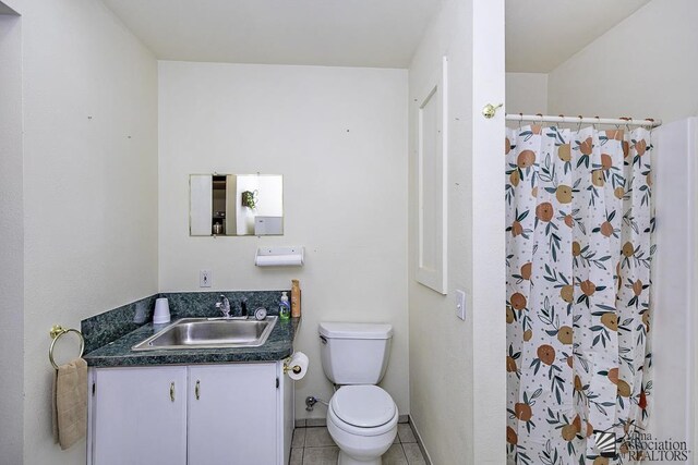13734 E 47th Dr, Yuma, AZ 85367 - full bathroom with vanity, tile patterned flooring, a shower with curtain, and toilet