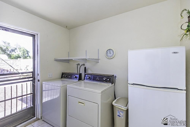 13734 E 47th Dr, Yuma, AZ 85367 - clothes washing area featuring laundry area, light tile patterned floors, and washing machine and clothes dryer