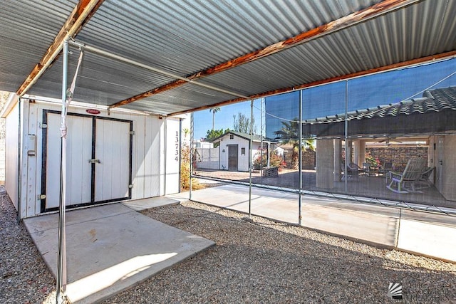 13734 E 47th Dr, Yuma, AZ 85367 - view of patio / terrace featuring a storage shed, a ceiling fan, and an outdoor structure