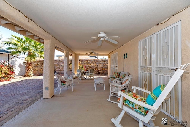 13734 E 47th Dr, Yuma, AZ 85367 - view of patio with a ceiling fan and fence