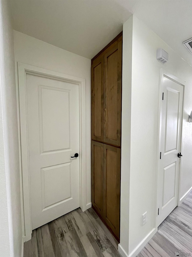 369 S 7th Ave, Yuma, AZ 85364 - hall with light wood finished floors and baseboards
