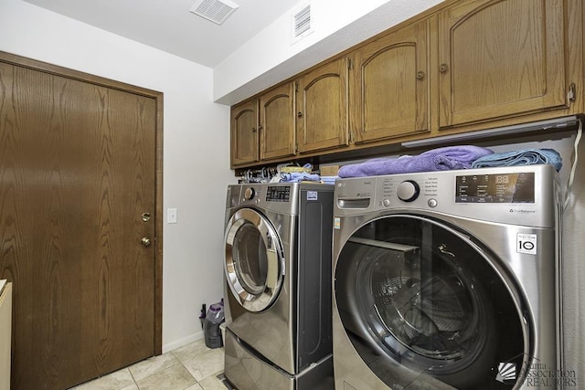 11546 E Via Montana, Yuma, AZ 85367 - clothes washing area with cabinet space, independent washer and dryer, baseboards, and visible vents