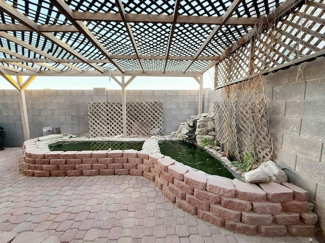 11451 E 27th Pl, Yuma, AZ 85367 - view of patio with a fenced backyard and a pergola
