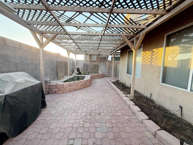 11451 E 27th Pl, Yuma, AZ 85367 - view of patio featuring a fenced backyard, a pergola, and a grill
