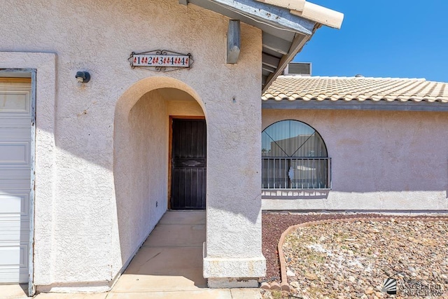 12344 E Calle Maria, Yuma, AZ 85367 - doorway to property with stucco siding and a tile roof
