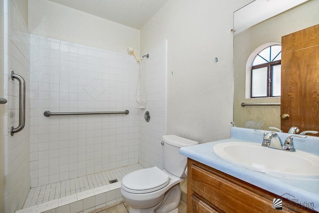 12344 E Calle Maria, Yuma, AZ 85367 - bathroom with toilet, a tile shower, and vanity