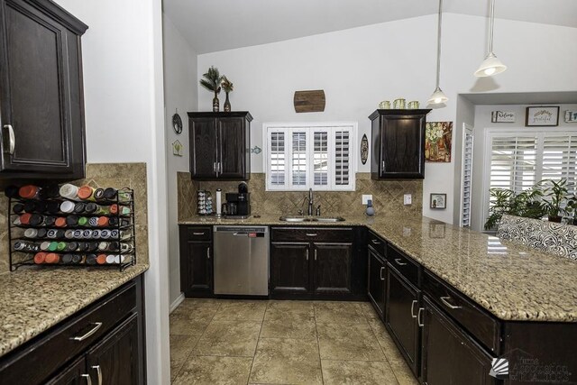 2793 S Aurora Ave, Yuma, AZ 85365 - kitchen featuring dishwasher, a sink, tasteful backsplash, plenty of natural light, and vaulted ceiling
