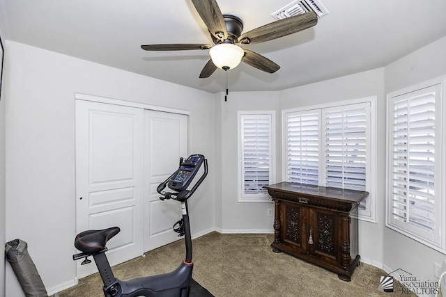 2793 S Aurora Ave, Yuma, AZ 85365 - workout area featuring carpet floors, a ceiling fan, and baseboards