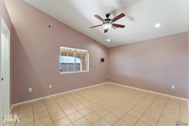 spare room featuring lofted ceiling, baseboards, recessed lighting, a ceiling fan, and light tile patterned floors