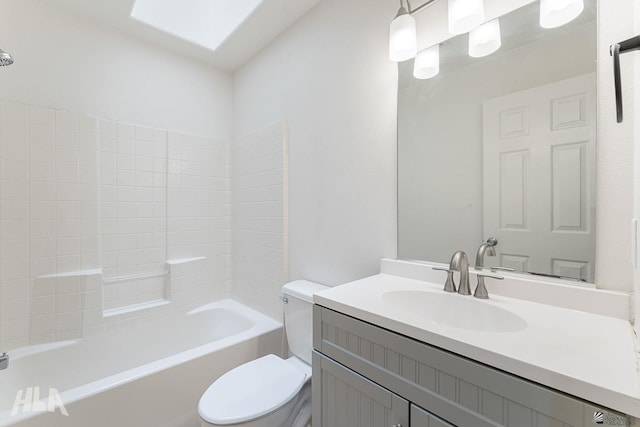 full bathroom featuring vanity, shower / bath combination, and toilet