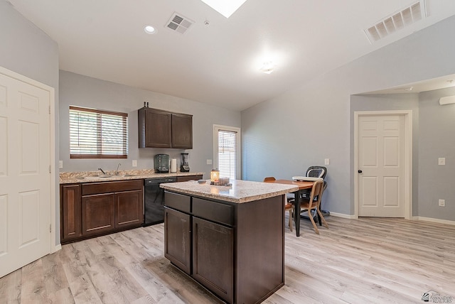 7309 E 37th Pl, Yuma, AZ 85365 - kitchen with dishwasher, lofted ceiling, plenty of natural light, light wood-type flooring, and dark brown cabinets