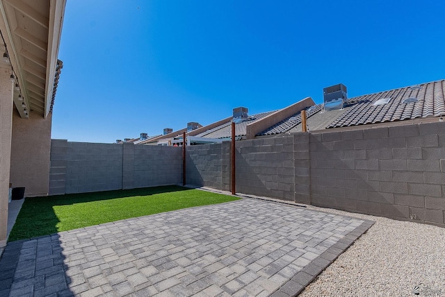 7309 E 37th Pl, Yuma, AZ 85365 - fenced backyard with a patio