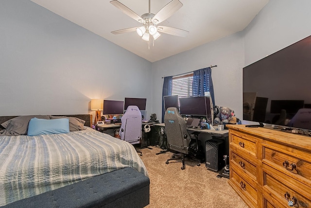 7309 E 37th Pl, Yuma, AZ 85365 - bedroom with light colored carpet, a desk, vaulted ceiling, and ceiling fan