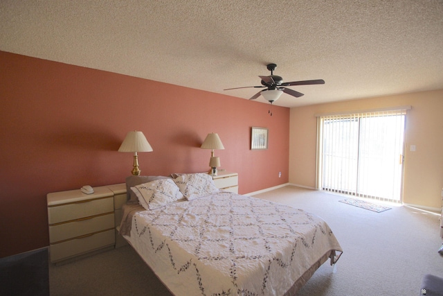 12459 E Del Rey Dr, Yuma, AZ 85367 - carpeted bedroom with baseboards, ceiling fan, and a textured ceiling