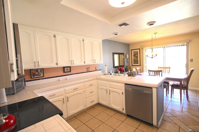12459 E Del Rey Dr, Yuma, AZ 85367 - kitchen featuring tile countertops, visible vents, stainless steel dishwasher, a peninsula, and white cabinetry