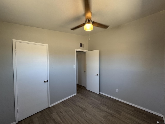 2641 S Las Palmas Vista Ave, Yuma, AZ 85364 - unfurnished bedroom featuring wood finished floors, baseboards, and ceiling fan