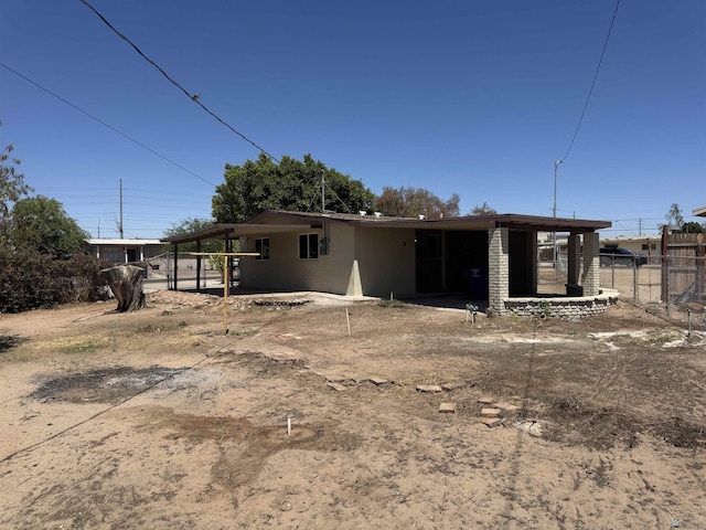 2641 S Las Palmas Vista Ave, Yuma, AZ 85364 - back of house with an attached carport