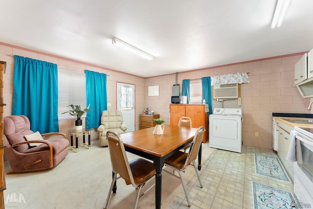 29433 San Jose Ave, Wellton, AZ 85356 - dining area featuring washer / clothes dryer and a wall mounted air conditioner