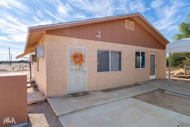 29433 San Jose Ave, Wellton, AZ 85356 - view of front facade featuring concrete block siding and a patio