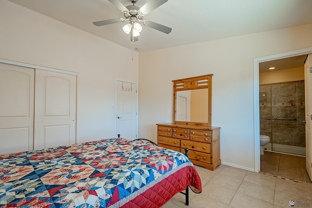 13743 E 45th Ln, Yuma, AZ 85367 - bedroom with a closet, baseboards, ceiling fan, connected bathroom, and light tile patterned floors