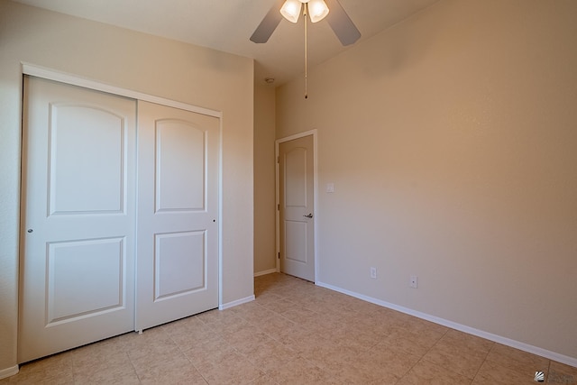 13743 E 45th Ln, Yuma, AZ 85367 - unfurnished bedroom with a ceiling fan, baseboards, and a closet