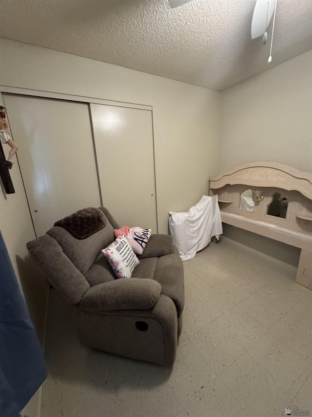 778 W Ramona St, Somerton, AZ 85350 - bedroom featuring a closet, a ceiling fan, and a textured ceiling
