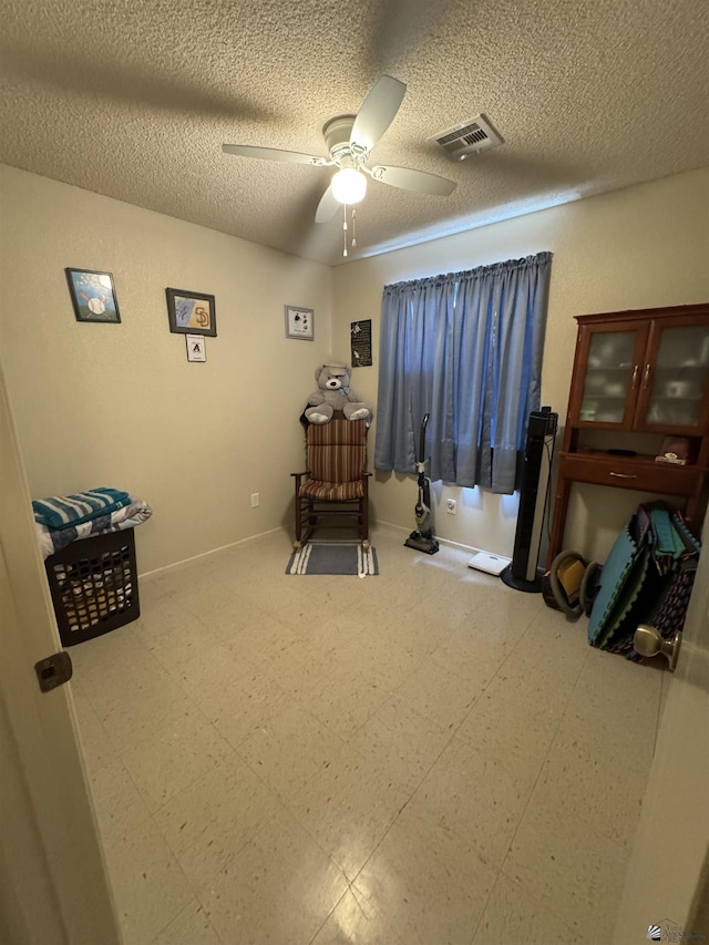 778 W Ramona St, Somerton, AZ 85350 - interior space featuring visible vents, a ceiling fan, a textured ceiling, and tile patterned floors
