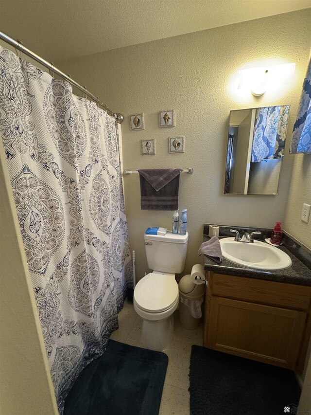 778 W Ramona St, Somerton, AZ 85350 - bathroom featuring vanity, a shower with curtain, and toilet