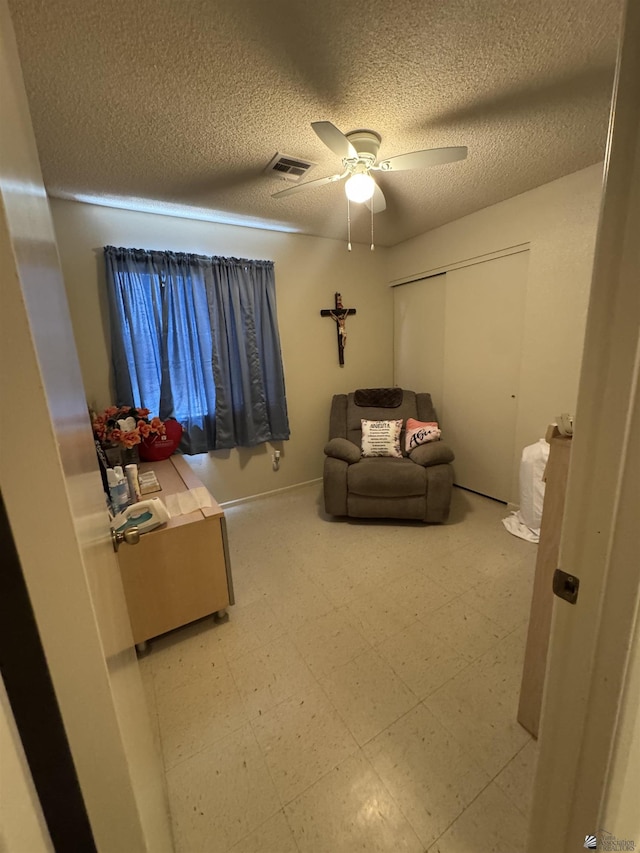 778 W Ramona St, Somerton, AZ 85350 - interior space with tile patterned floors, a ceiling fan, a textured ceiling, and visible vents