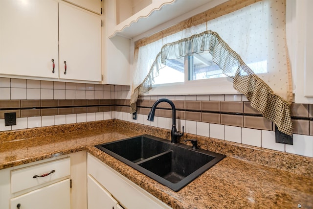 500 S 7th Ave, Yuma, AZ 85364 - kitchen with backsplash and white cabinetry