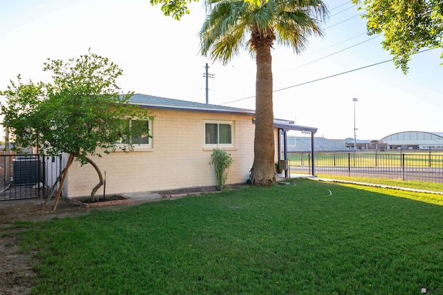 500 S 7th Ave, Yuma, AZ 85364 - view of side of home with brick siding