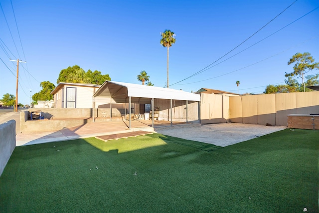 500 S 7th Ave, Yuma, AZ 85364 - back of house featuring a fenced backyard and a patio area