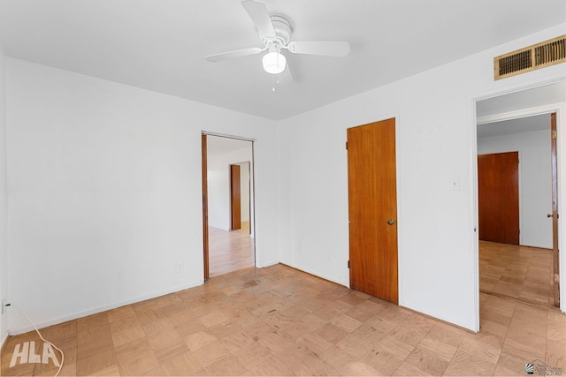 324 S 19th Ave, Yuma, AZ 85364 - unfurnished bedroom with a ceiling fan and visible vents