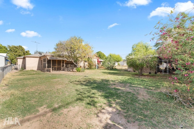 324 S 19th Ave, Yuma, AZ 85364 - view of yard with a sunroom and a fenced backyard