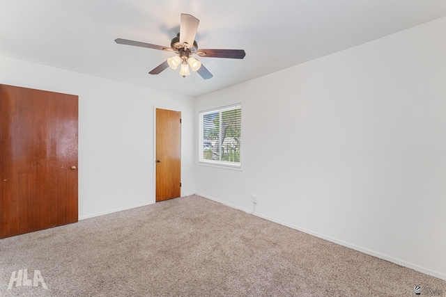 324 S 19th Ave, Yuma, AZ 85364 - unfurnished bedroom with baseboards, a ceiling fan, and carpet floors