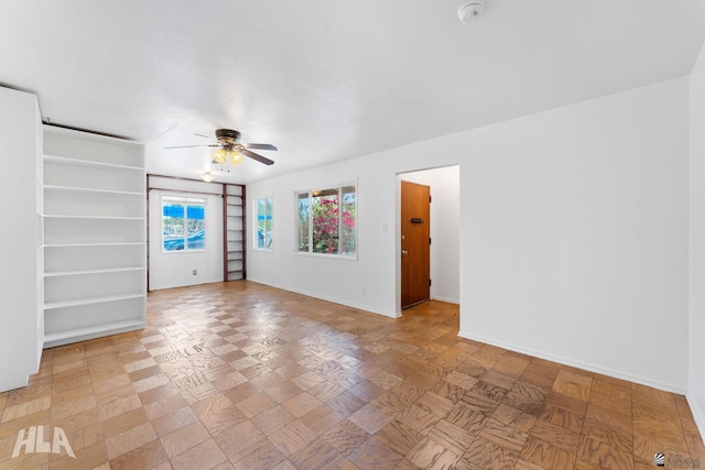 324 S 19th Ave, Yuma, AZ 85364 - interior space with baseboards and a ceiling fan