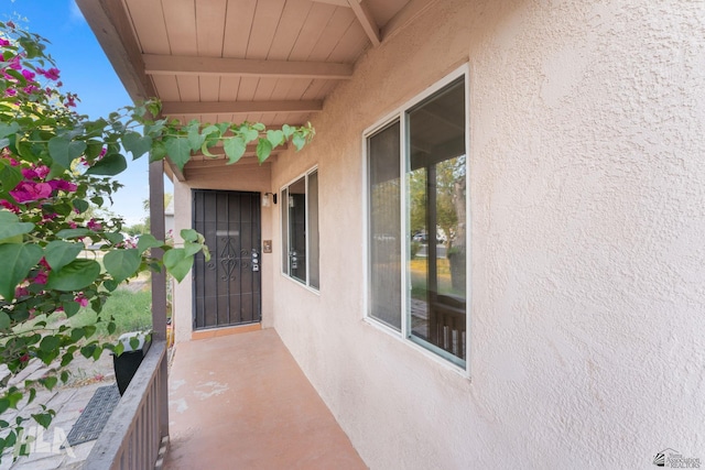 324 S 19th Ave, Yuma, AZ 85364 - doorway to property with stucco siding