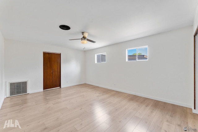 324 S 19th Ave, Yuma, AZ 85364 - spare room featuring light wood finished floors, baseboards, a ceiling fan, and visible vents