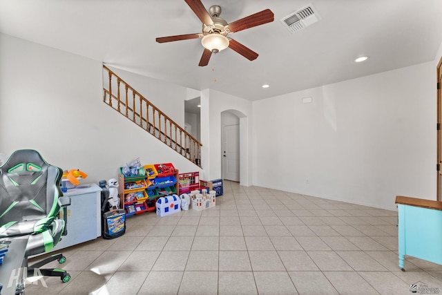 playroom with visible vents, ceiling fan, recessed lighting, tile patterned floors, and arched walkways