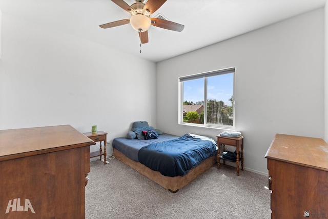 bedroom with baseboards, light carpet, and ceiling fan