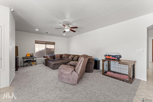living room featuring ceiling fan, recessed lighting, baseboards, light tile patterned floors, and visible vents