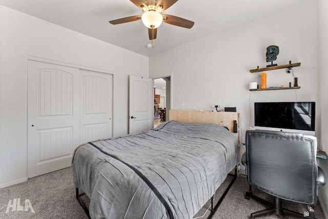 carpeted bedroom featuring a closet, a ceiling fan, and baseboards