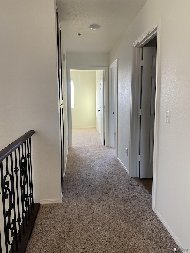 3806 S Sol Dr, Yuma, AZ 85365 - corridor with baseboards and carpet flooring