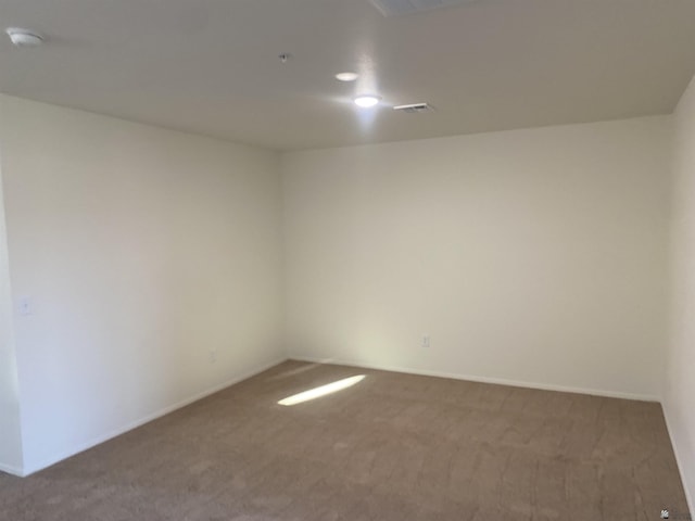 3806 S Sol Dr, Yuma, AZ 85365 - spare room featuring baseboards, carpet, and visible vents