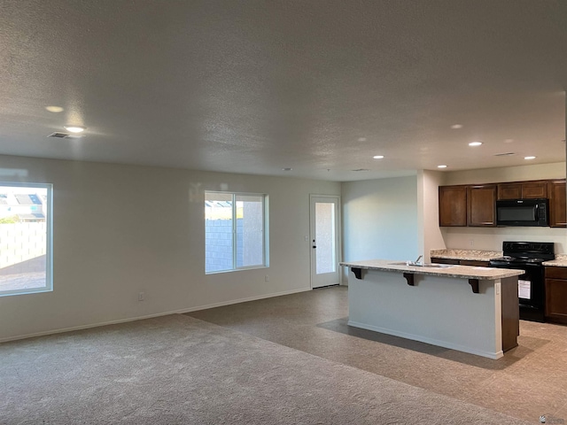 3806 S Sol Dr, Yuma, AZ 85365 - kitchen featuring a sink, light countertops, recessed lighting, baseboards, and black appliances