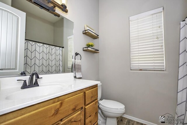 7955 E 37th St, Yuma, AZ 85365 - bathroom with vanity and toilet